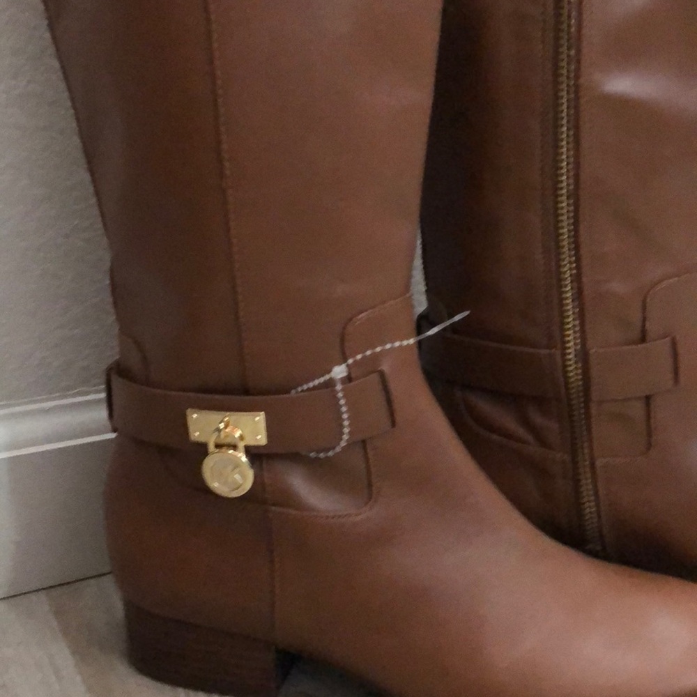 Brown Michael Korrs boots.
